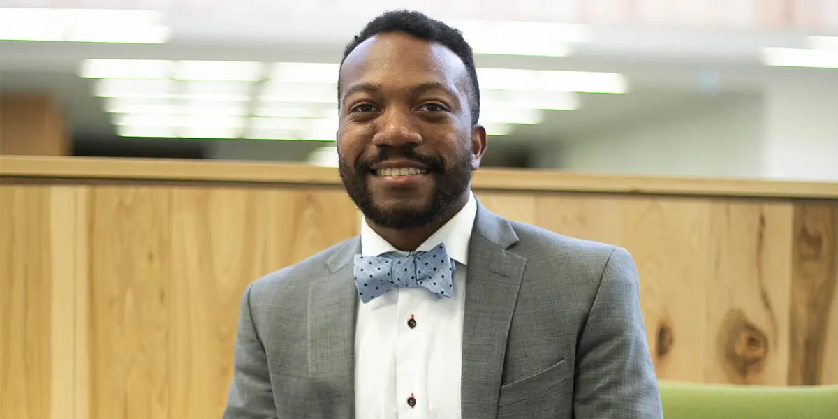 Devaughan Forrest smiling at the camera.