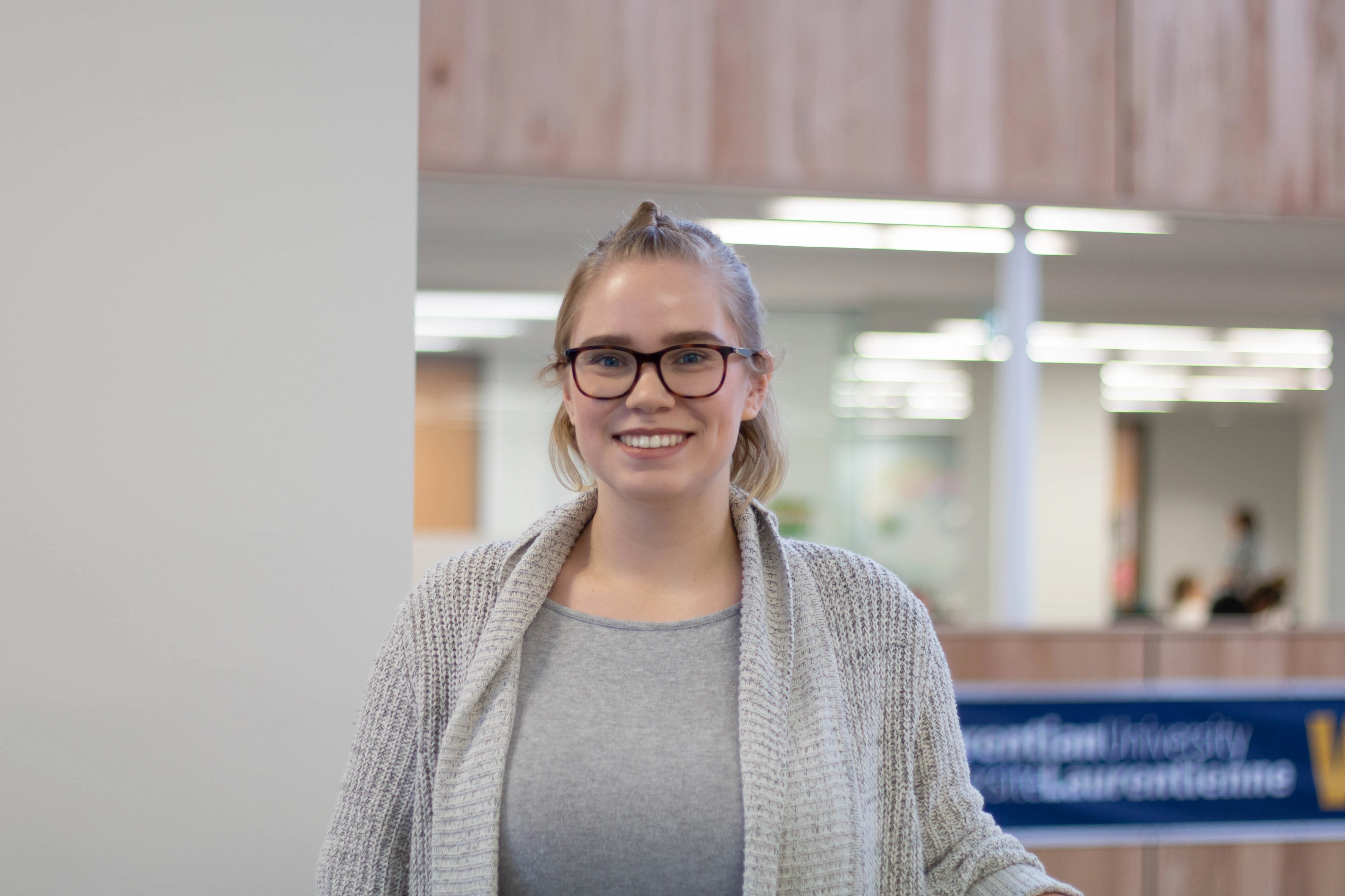 Kendra Rehel Buchanan is smiling while on campus.