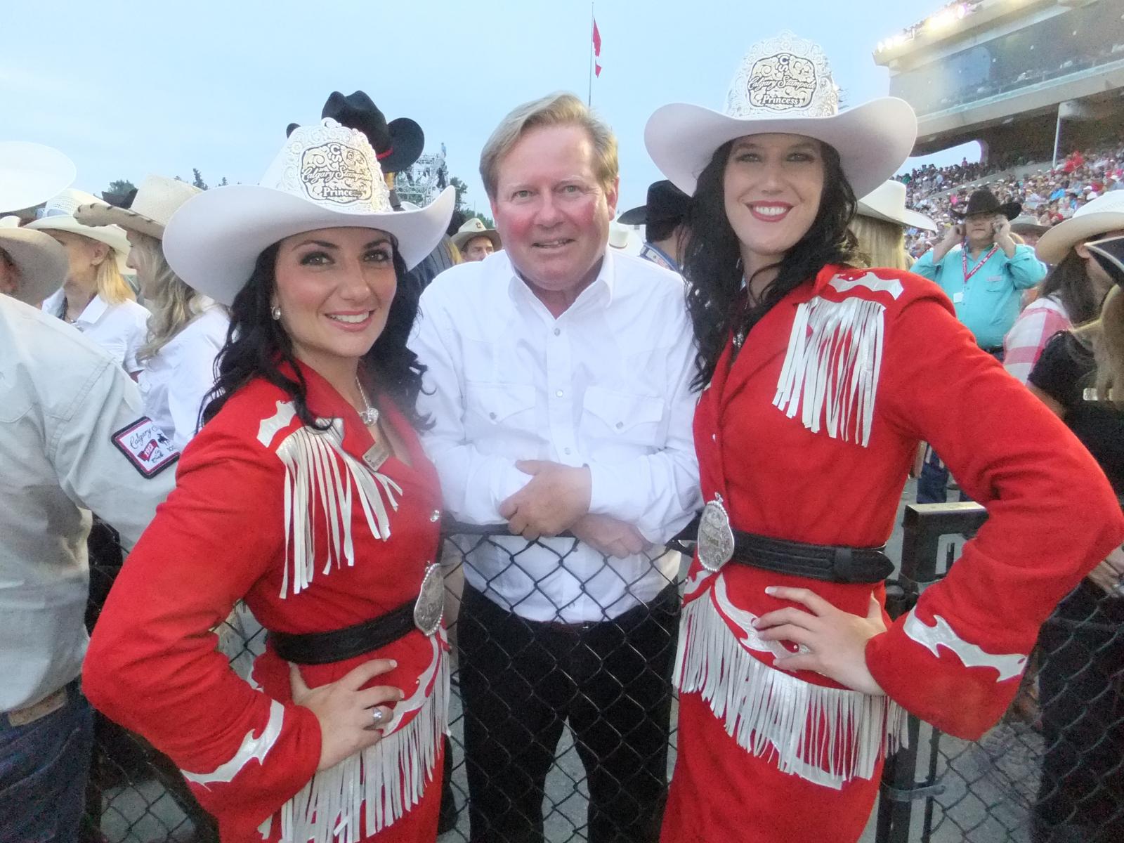 Kerry Moynihan at a country festival next to two young females 