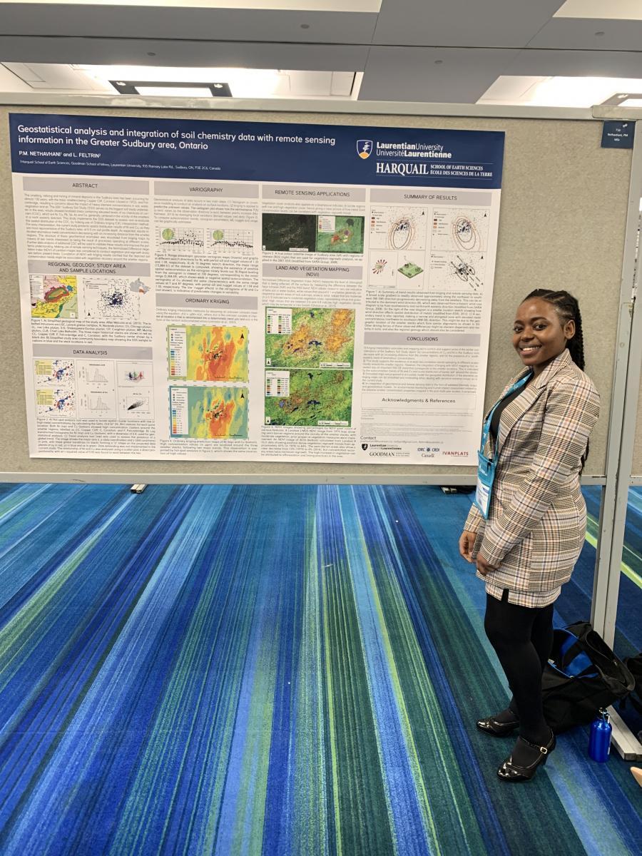 Phathutshedzo Molly Nethavhani with her research poster