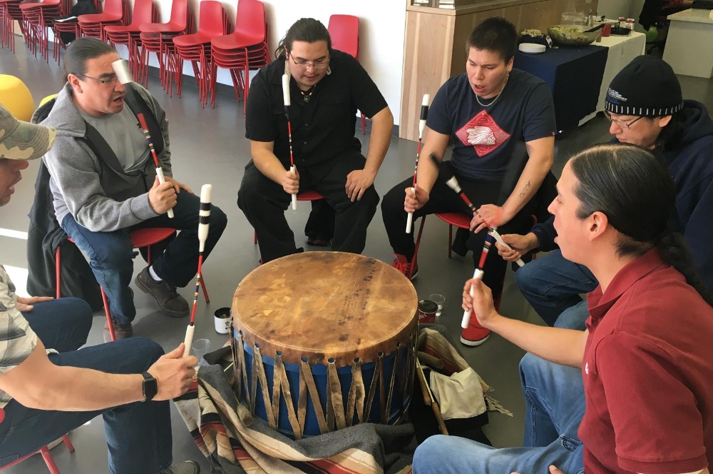 People playing the drum
