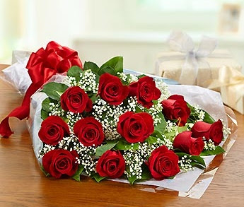 Red roses tied with a red ribbon