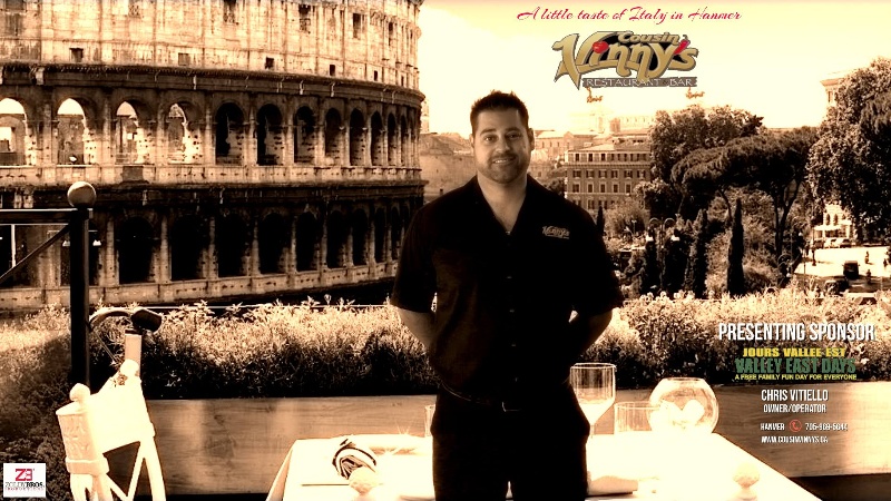 Chris Vitiello with the colosseum behind him 