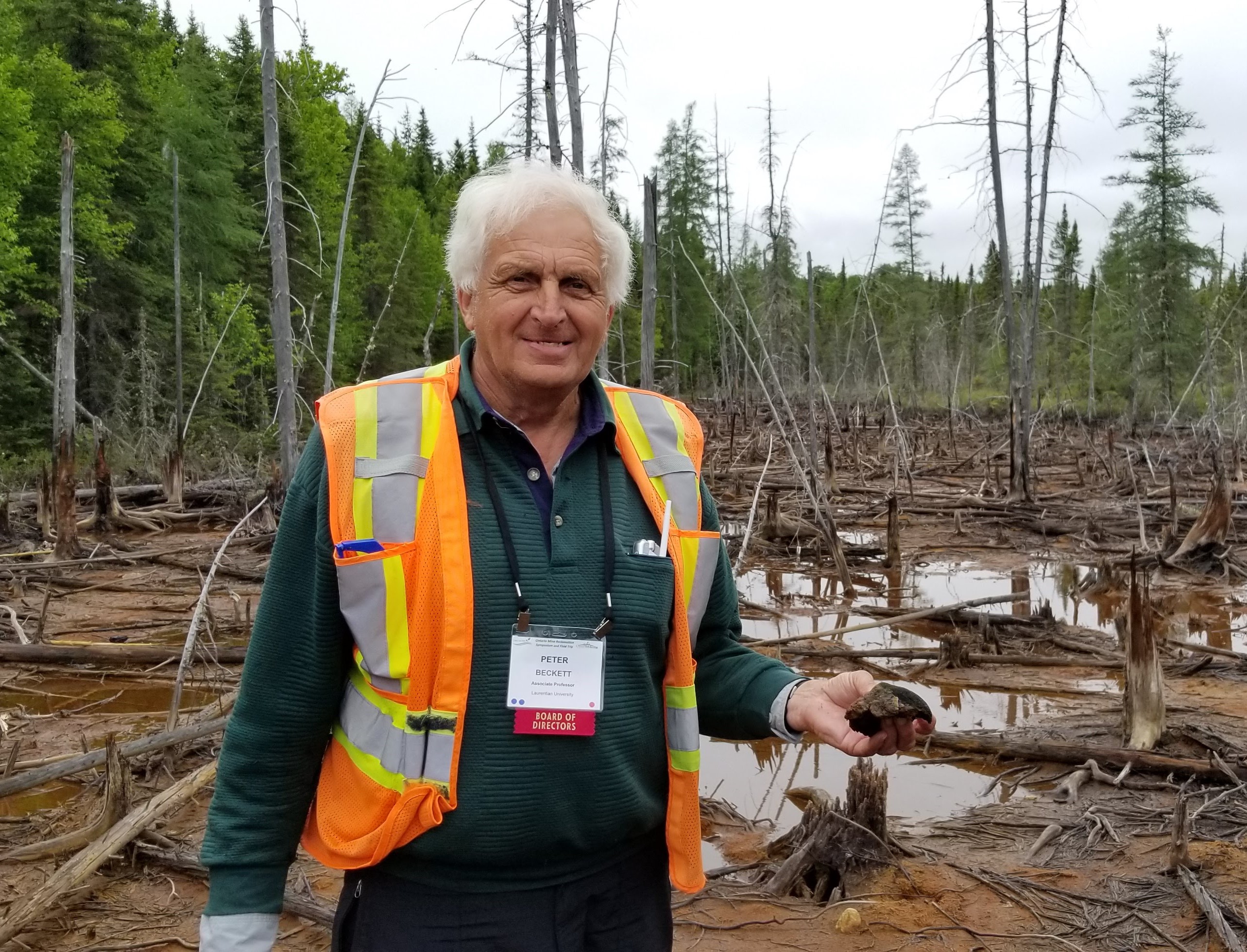 Peter Beckett standing in a wetland