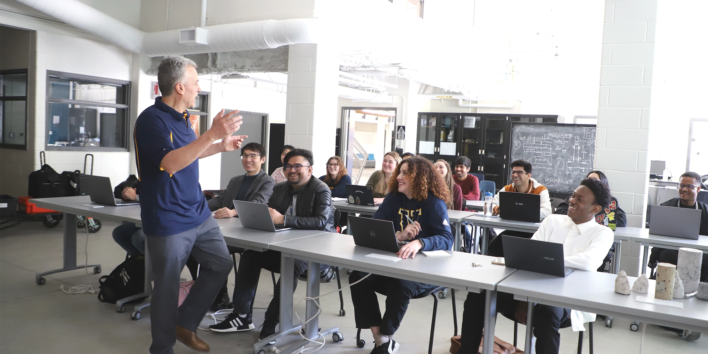 A Laurentian University professor teaching a classroom of students.