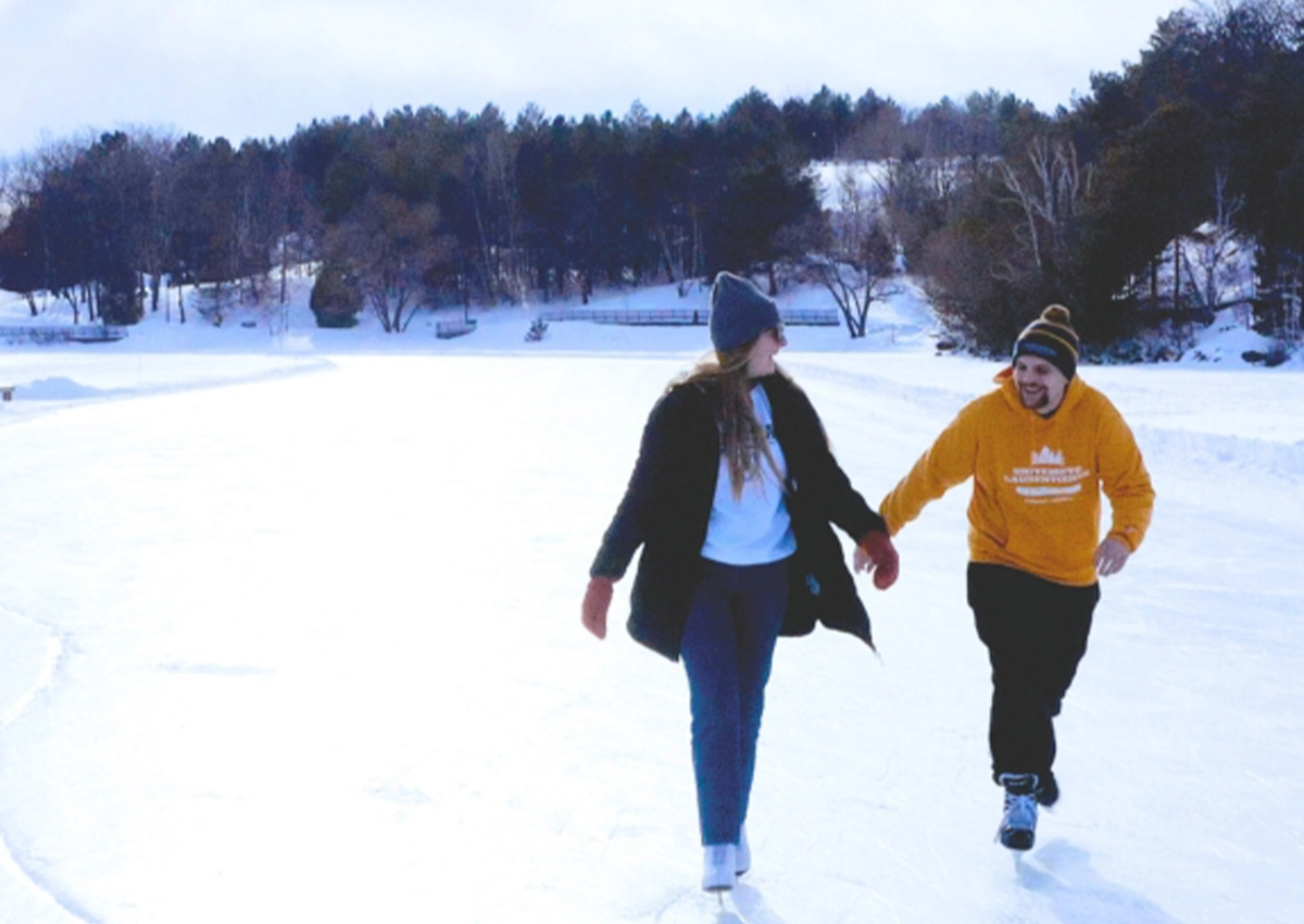 Two Laurentian University students ice skating on Ramsey Lake.