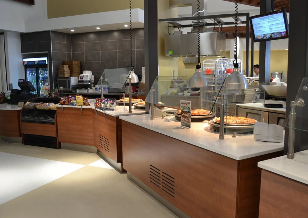 The great hall at Laurentian University with food displayed.