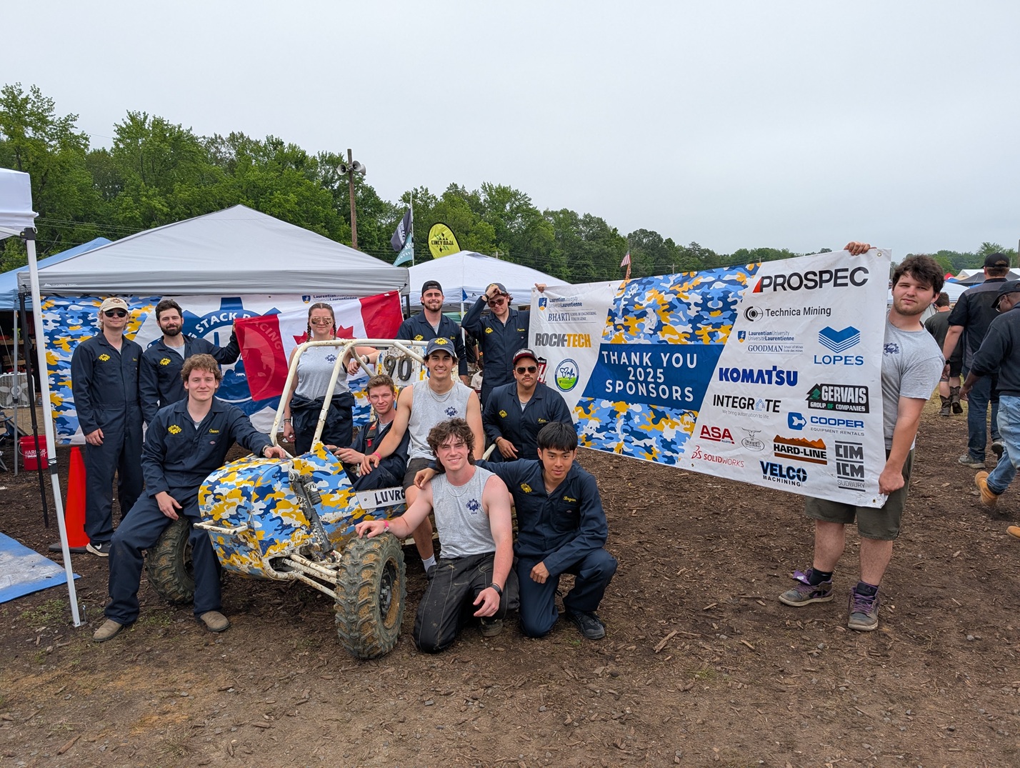 The LUVRC team and their buggy car at a competition