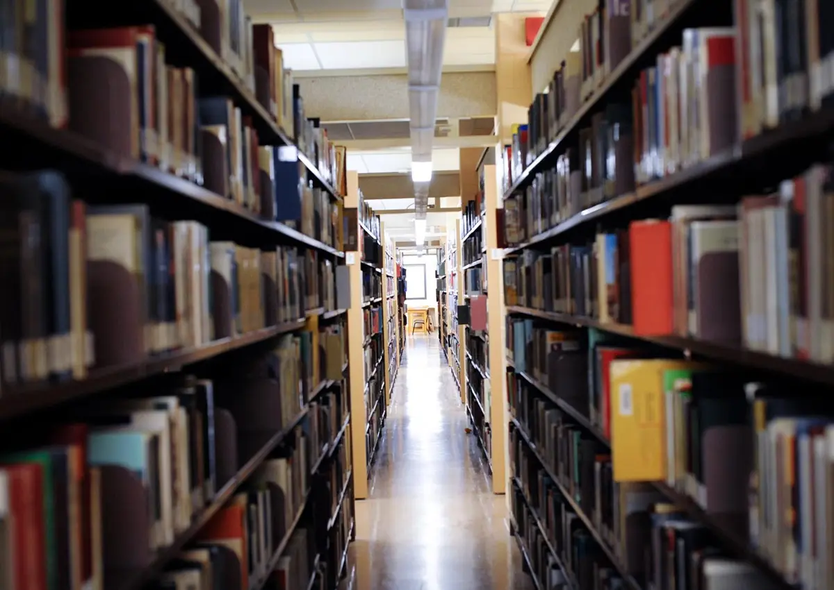 Library with books on bookshelves