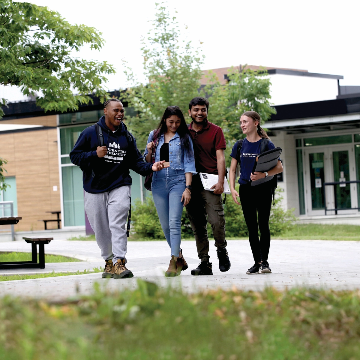 Laurentian University students walking on campus.
