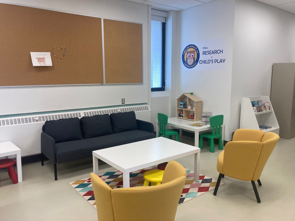 Minds and Morality reception area with couch and toys