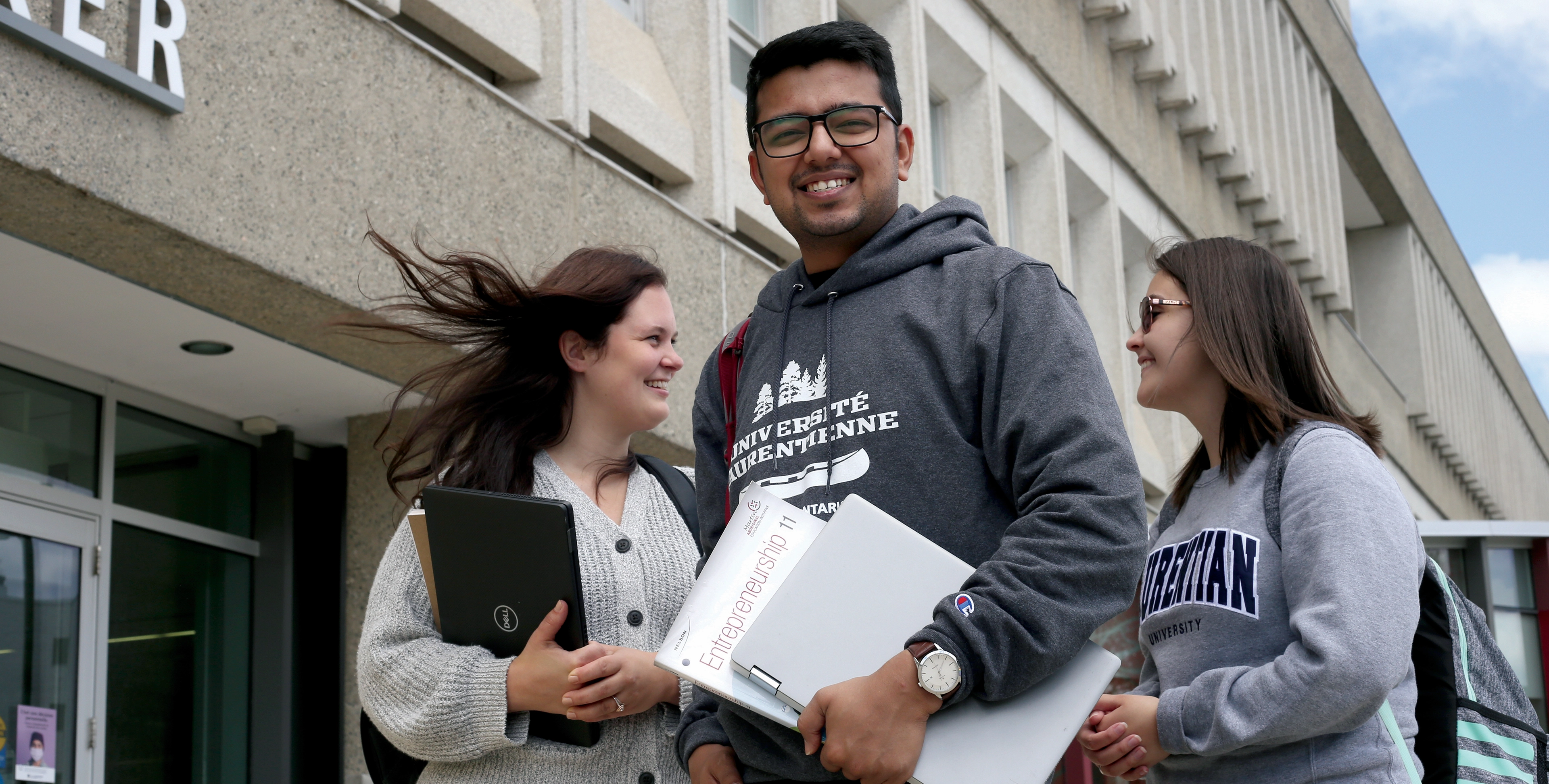 Laurentian University students in front of the R.D. Parker Building.