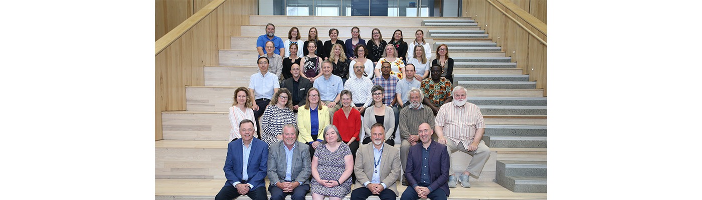 Laurentian University faculty in attendance at a campus event that recognized their achievements