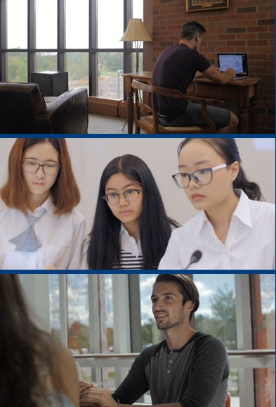 Three students working on a computer