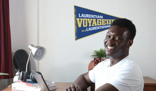 A Laurentian University student in his residence room.