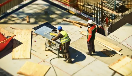 Construction workers on a work site.