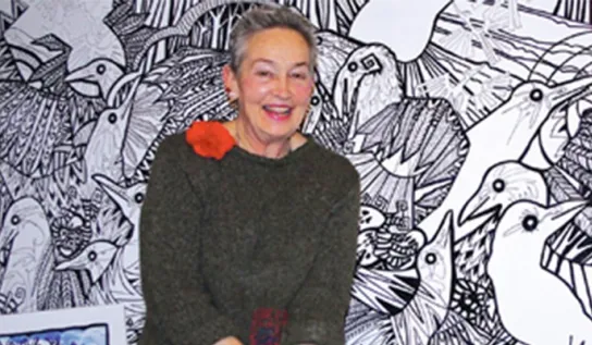 Heather Topp displaying her artwork.