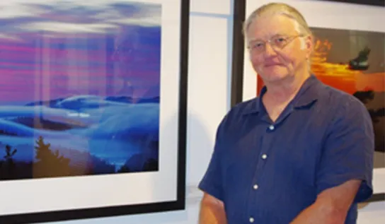 Jon Butler displaying his artwork.