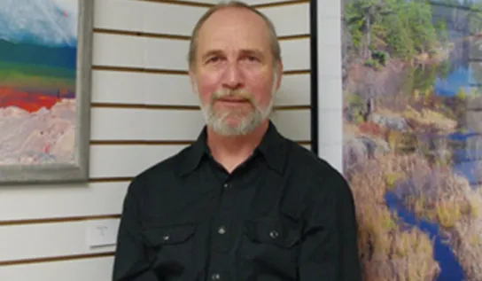 Nick Dubecki displaying his artwork.