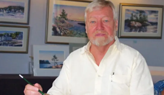 Richard Edwards displaying his artwork.