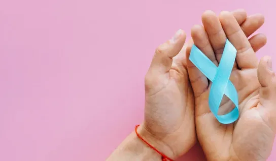 Person holding a sexual awareness ribbon