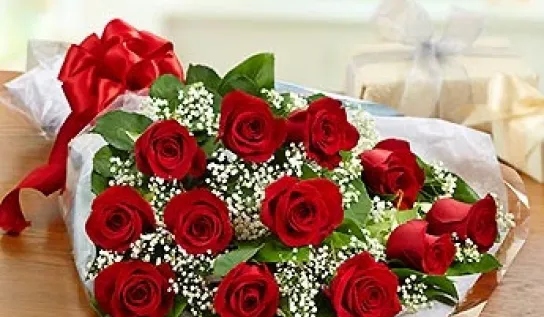 Red roses tied with a red ribbon