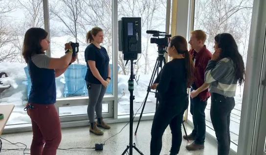 A crew recording a person