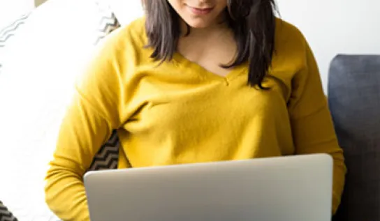 A student using their laptop