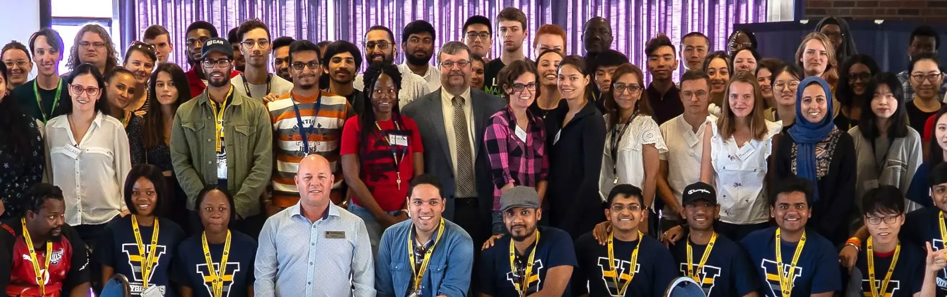A group of staff, students and faculty at International Orientation.