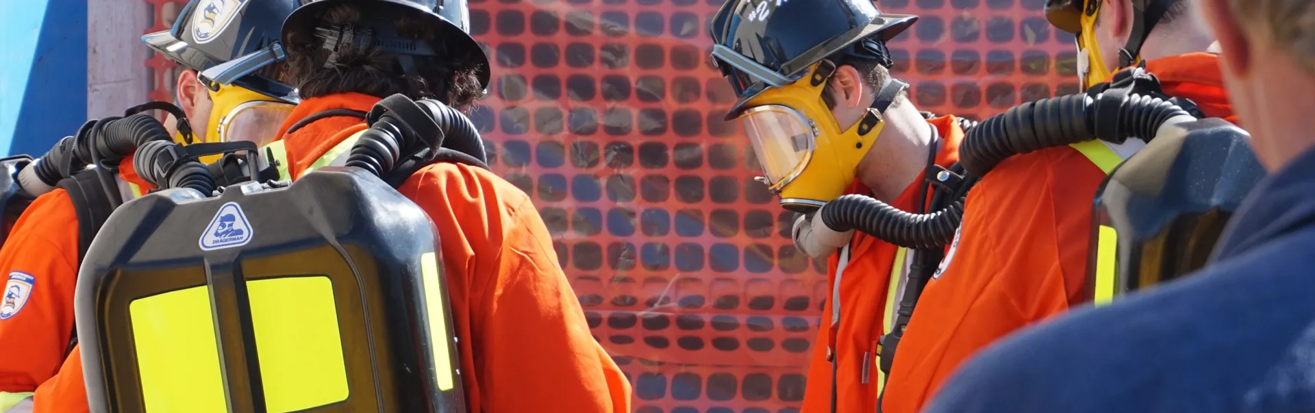 Students dressed in firefighting outfits