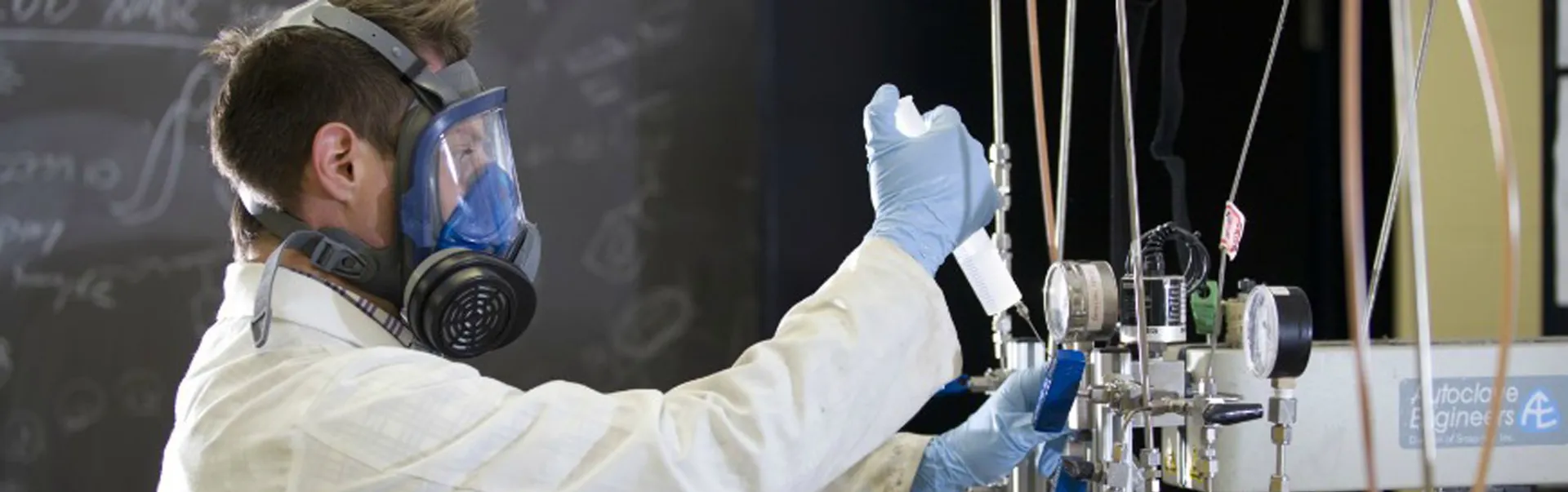 A chemical engineering student working in the lab.