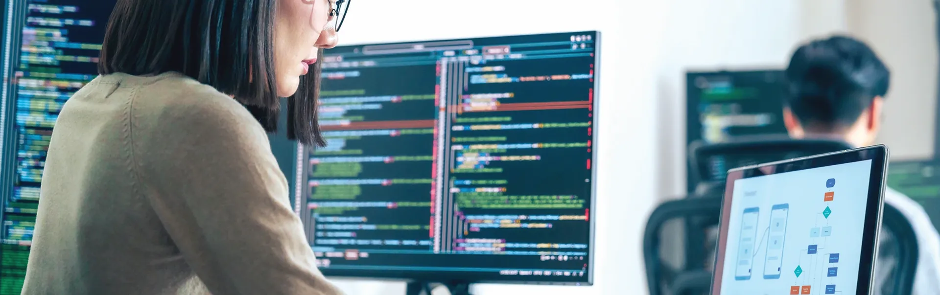 A computer programmer on her computer.