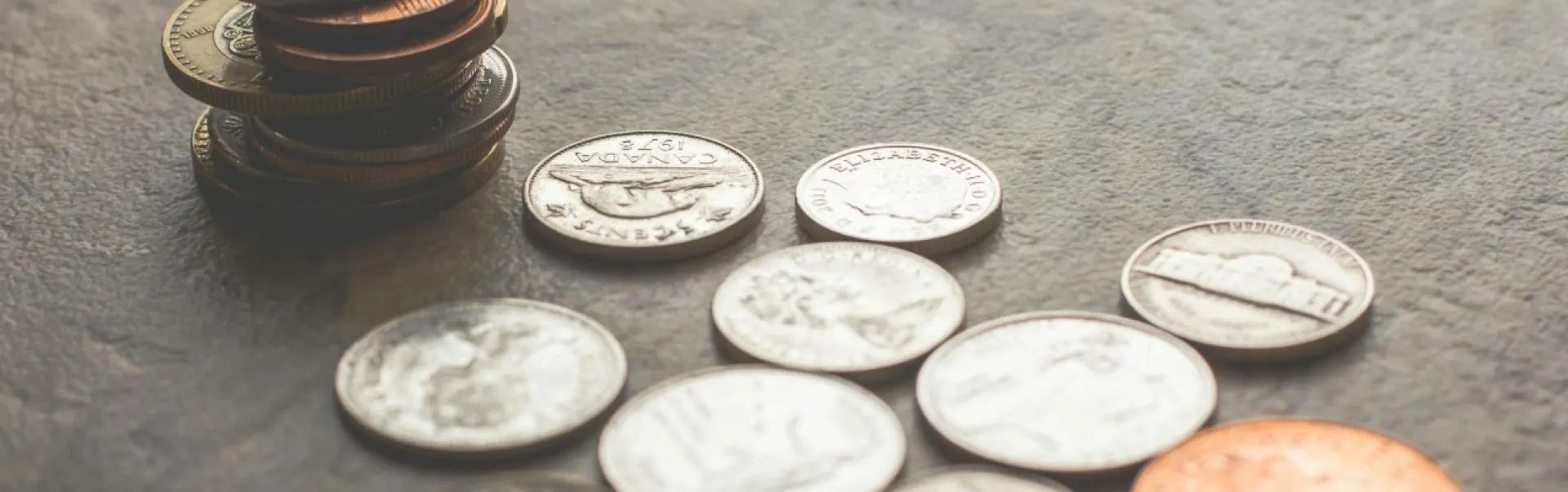 Coins piled up on a table