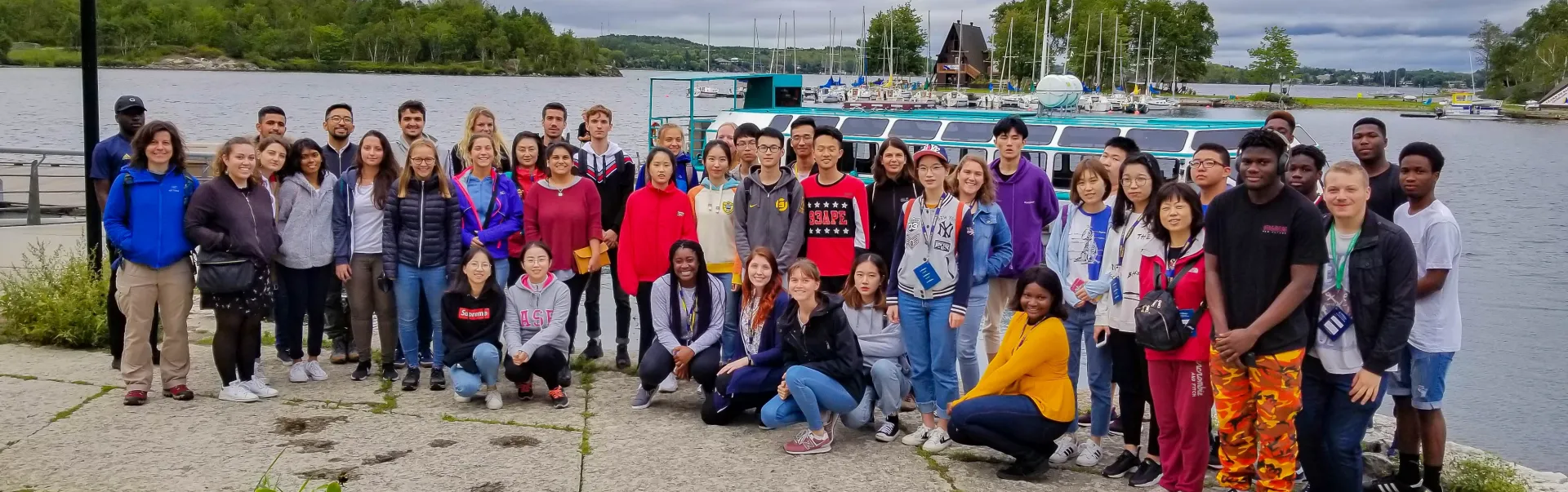 A group of International students by the waterfront