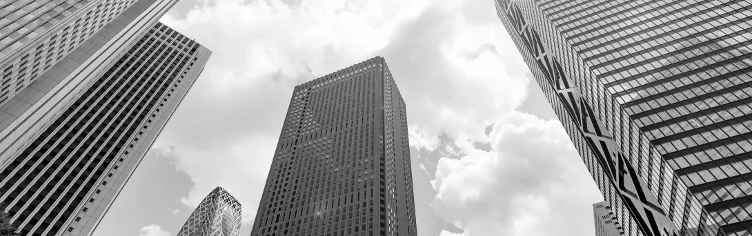Tall buildings downtown with sky in background