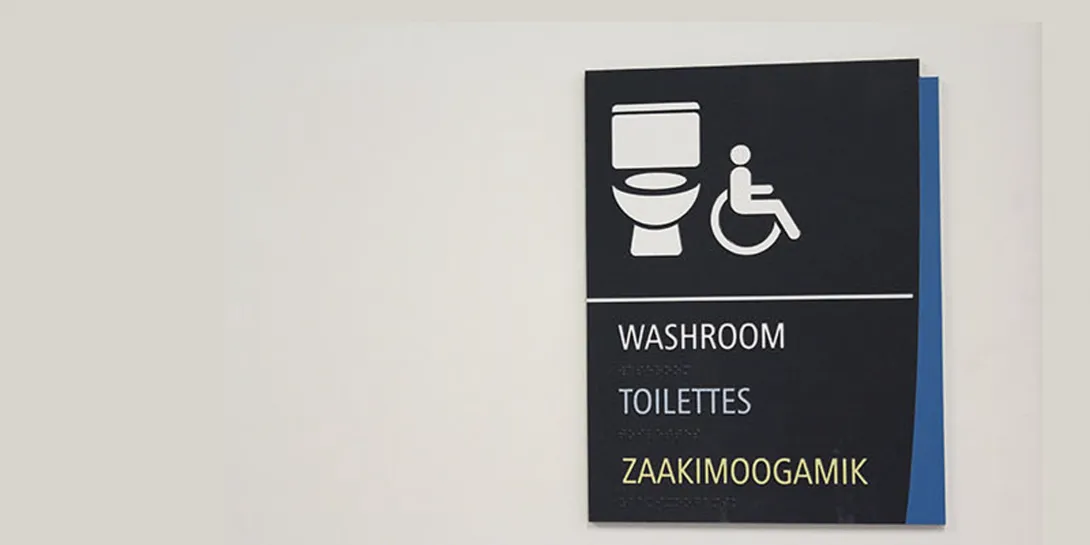 An accessible washroom sign.