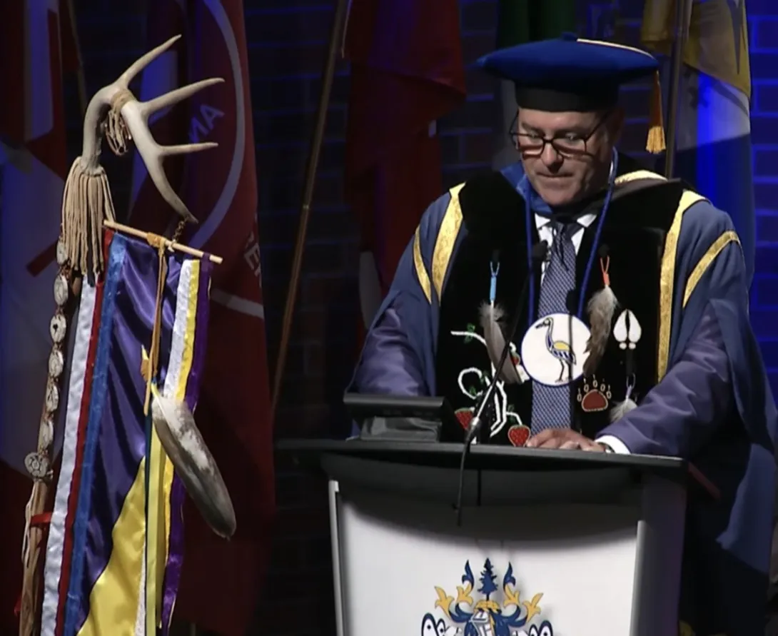 Laurentian University Chancellor Kristan Straub being presented with the custom Crane Clan chancellor’s medallion during his installation ceremony at the Spring Convocation.