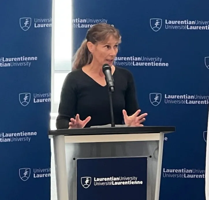 Dr. Jacqueline Litzgus speaking at Laurentian University event.